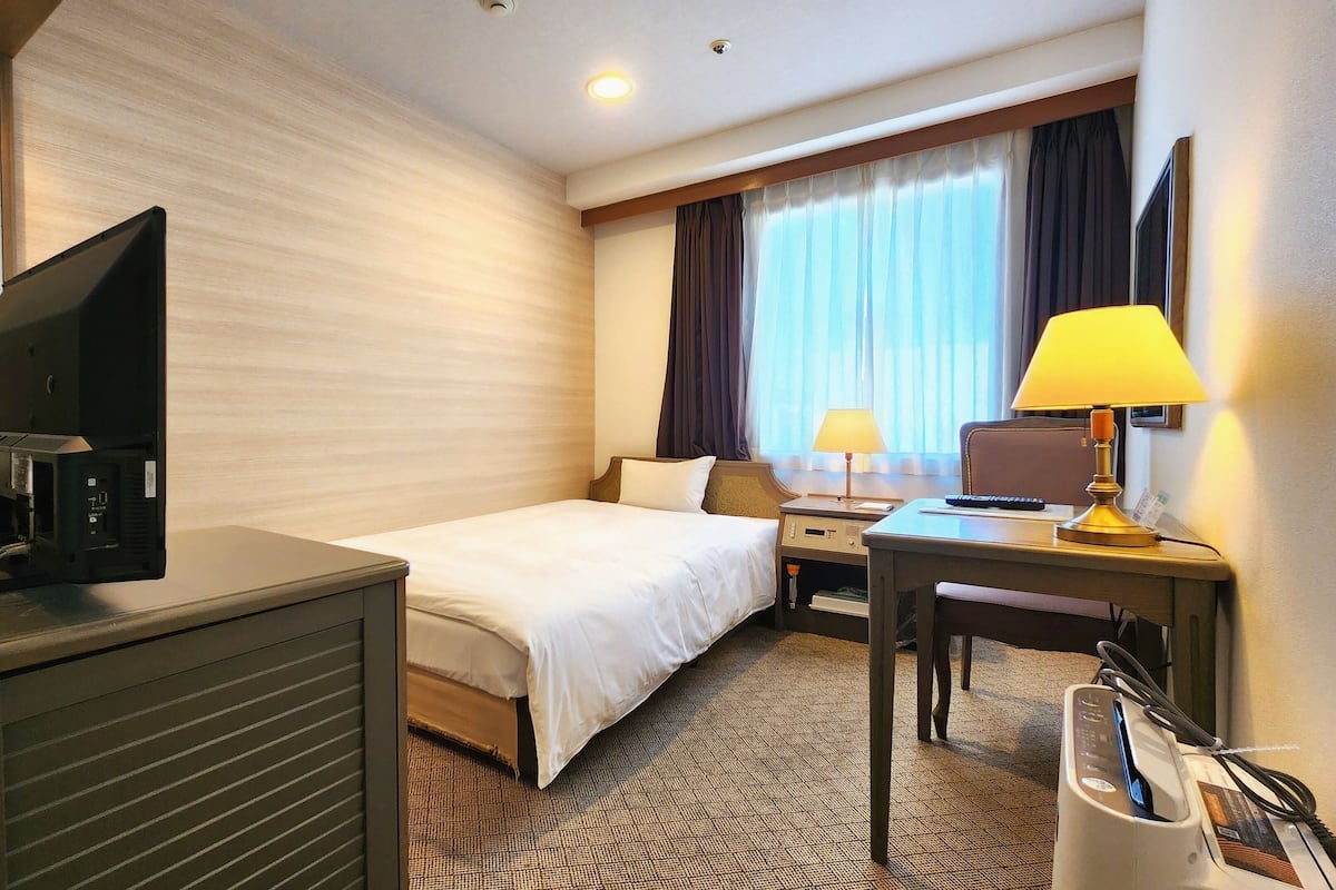 Desk, blackout curtains, iron/ironing board, free WiFi