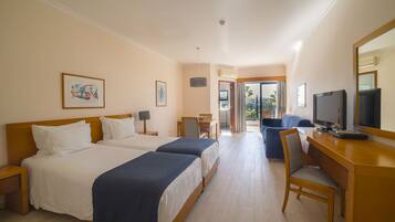 In-room safe, desk, laptop workspace, blackout curtains