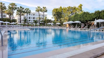 Indoor pool, pool umbrellas, pool loungers