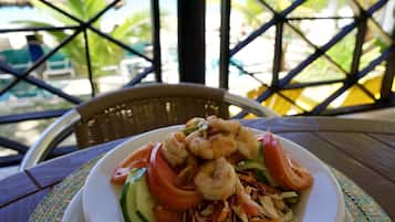 Breakfast, lunch served; local cuisine, beach views