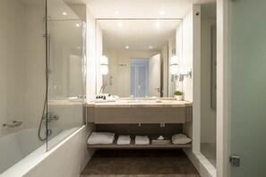 Eco-friendly toiletries, hair dryer, bathrobes, slippers