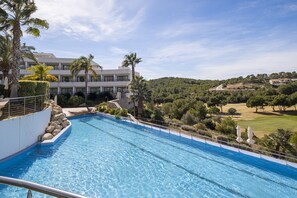 Indoor pool, seasonal outdoor pool, pool umbrellas, pool loungers
