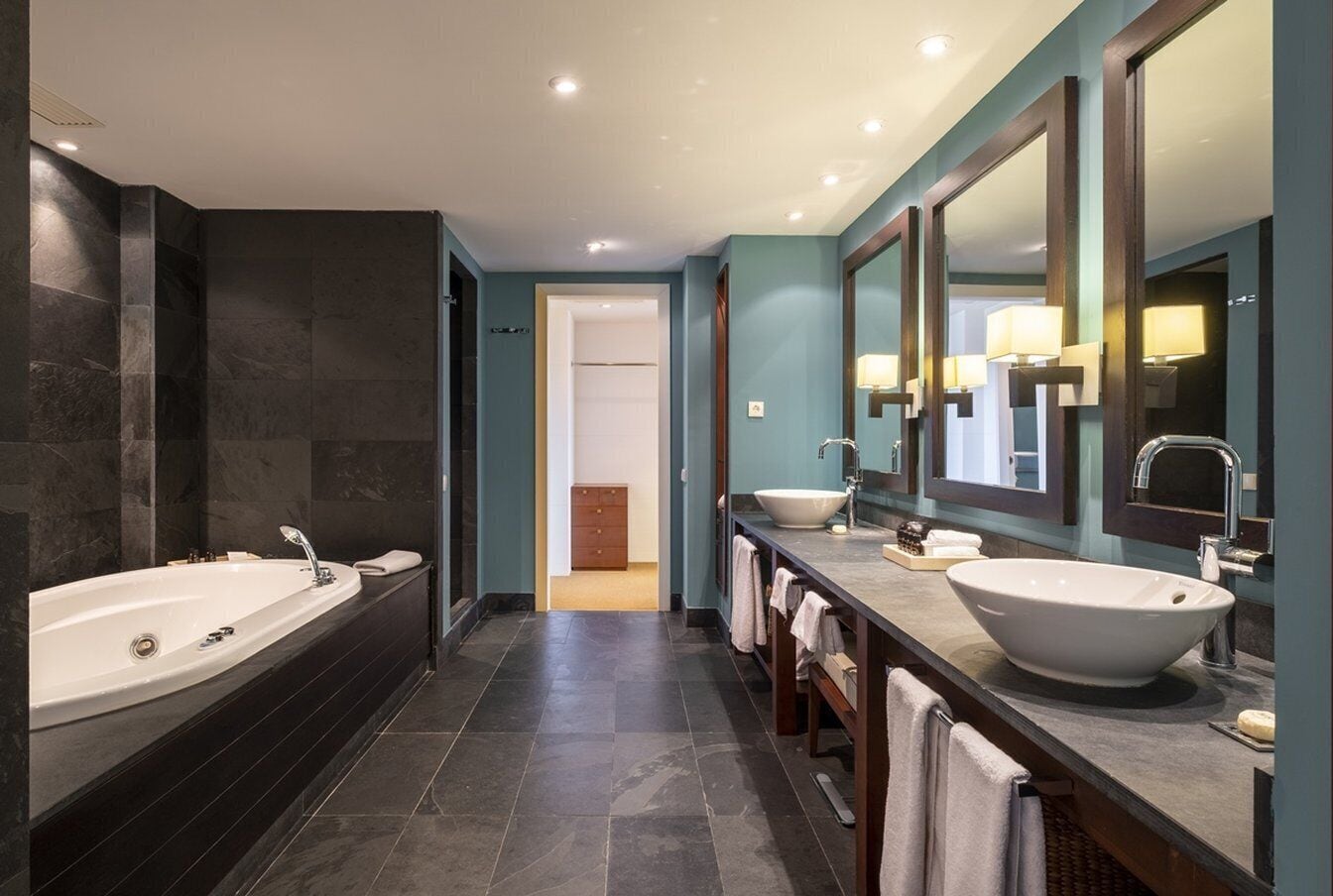 eco-friendly toiletries, hair dryer, bathrobes, slippers