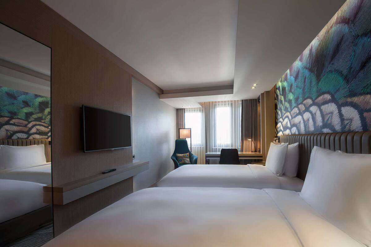 Premium bedding, down comforters, Select Comfort beds, minibar