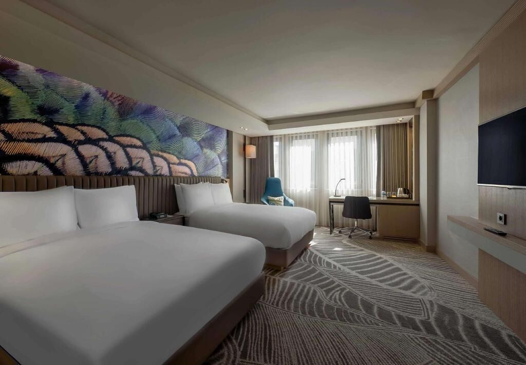 Premium bedding, down duvets, Select Comfort beds, minibar