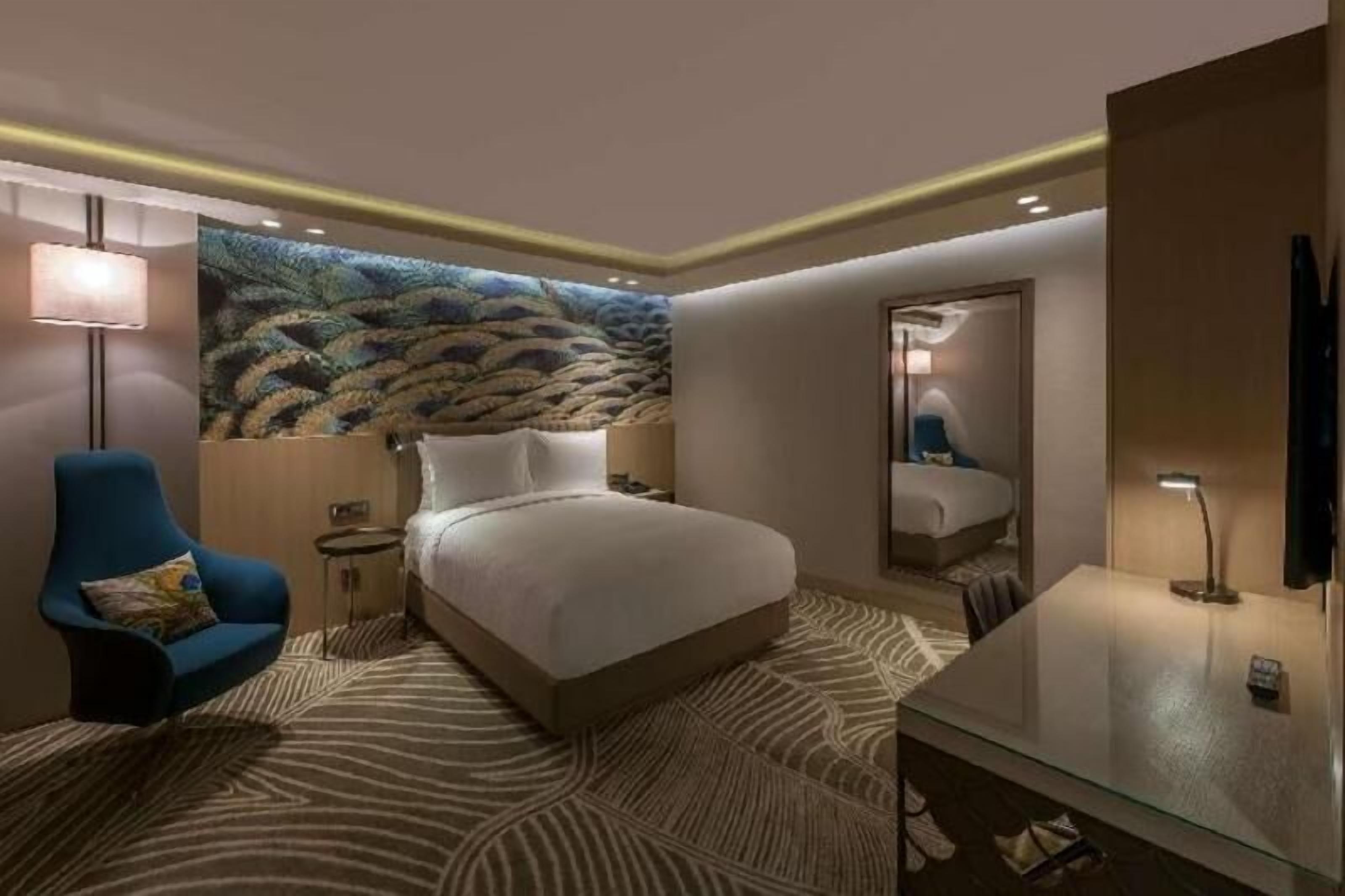 Premium bedding, down duvets, Select Comfort beds, minibar