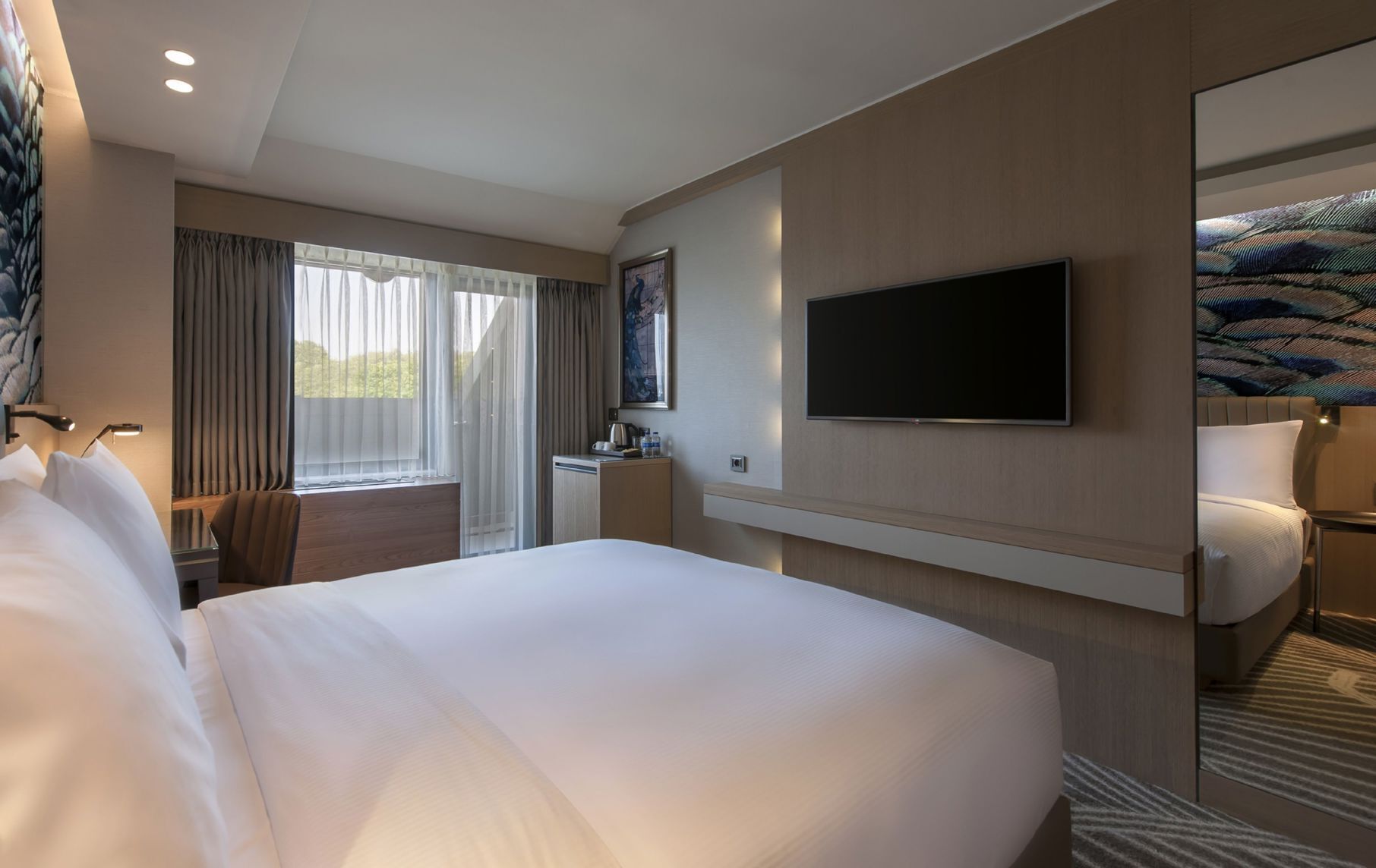 Premium bedding, down duvets, Select Comfort beds, minibar