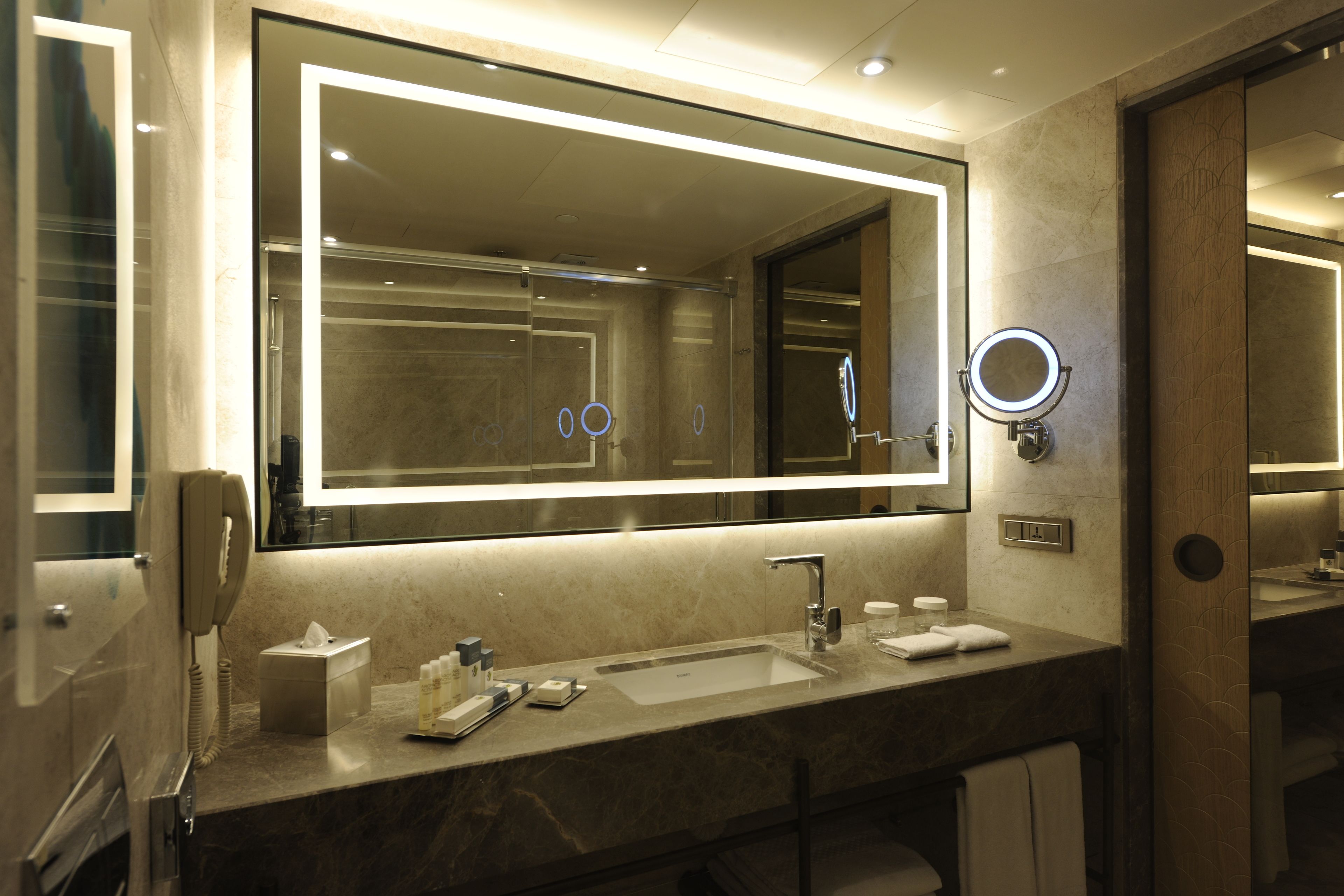 deluxe suite, 1 bedroom | bathroom | shower, designer toiletries, hair dryer, slippers