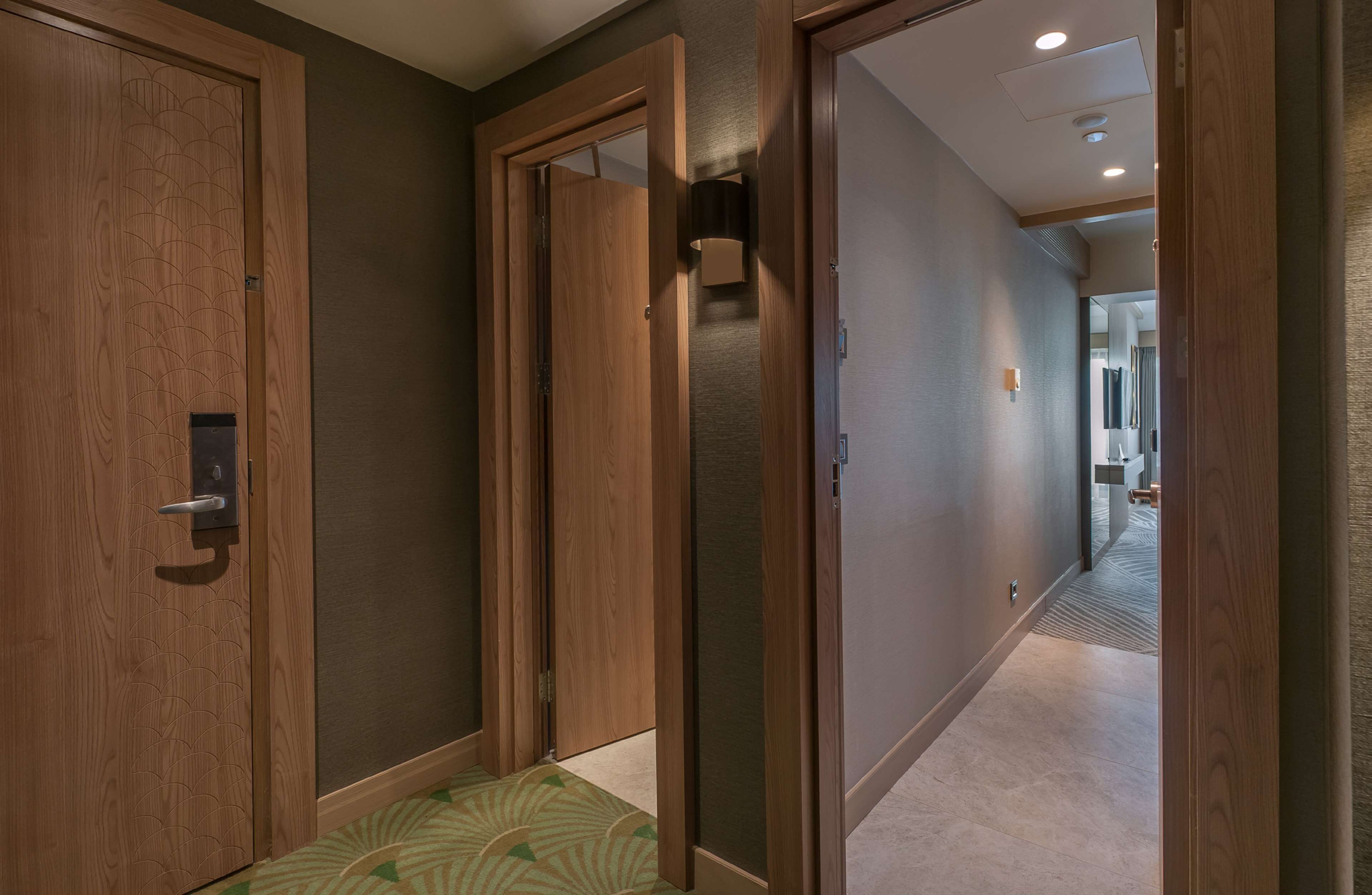 family room, 2 bedrooms | premium bedding, down duvets, select comfort beds, minibar