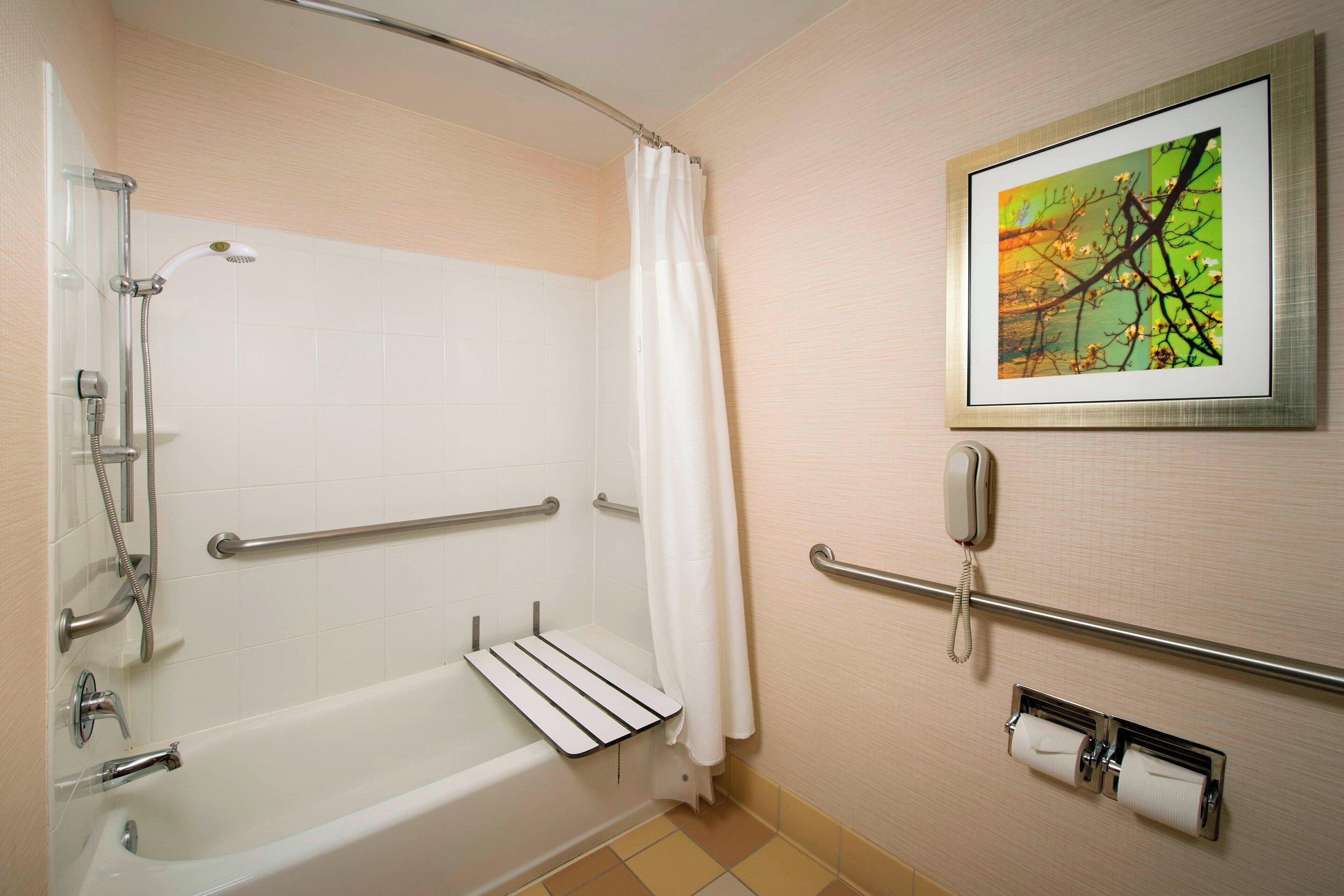 combined shower/bathtub, free toiletries, hair dryer, towels