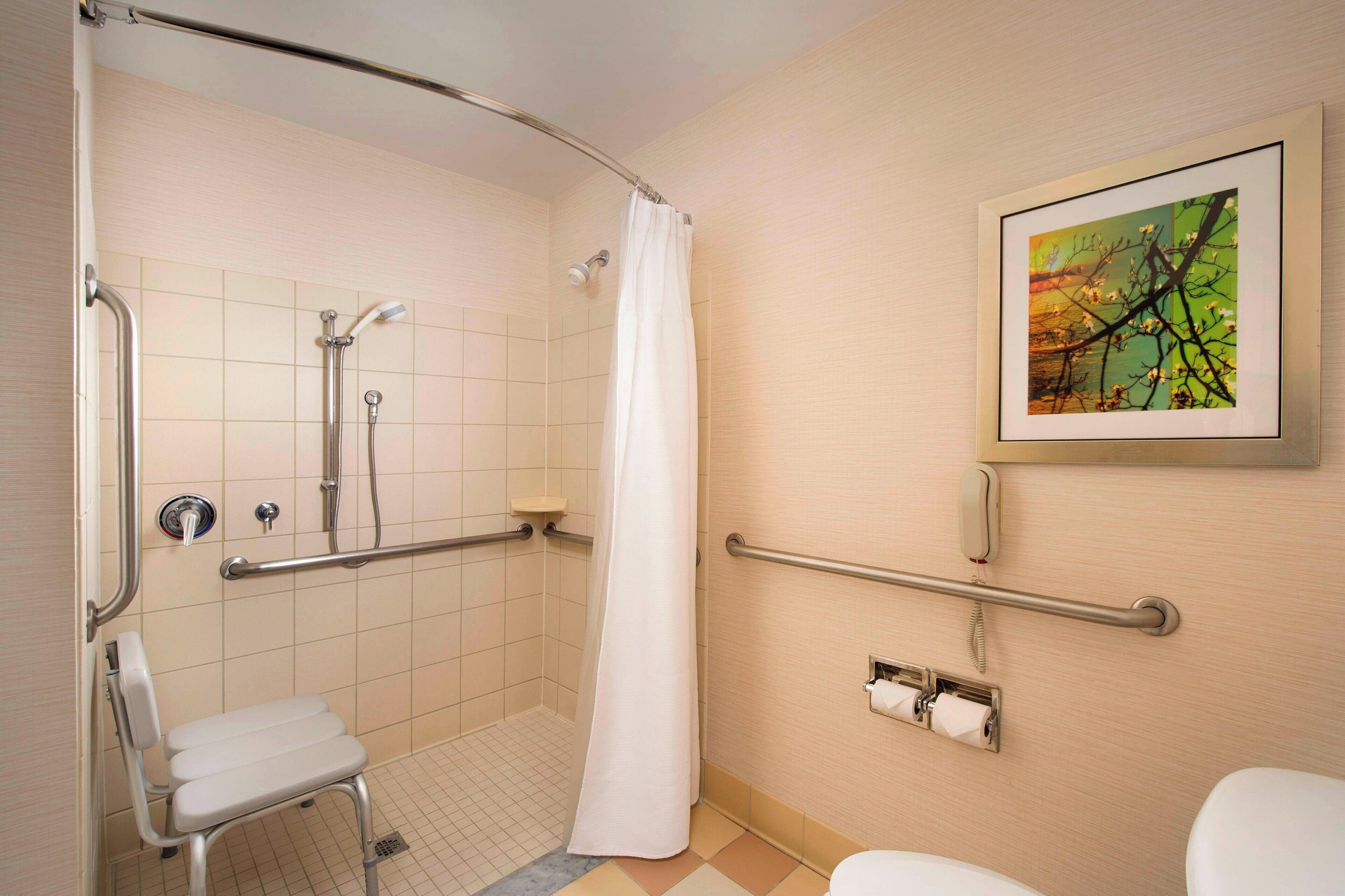 combined shower/bathtub, free toiletries, hair dryer, towels