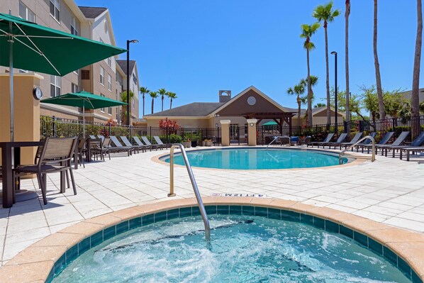 Outdoor pool, open 9:00 AM to 10:00 PM, sun loungers
