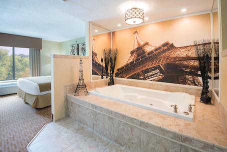Suite, 1 King Bed, Jetted Tub | In-room safe, desk, blackout drapes, iron/ironing board