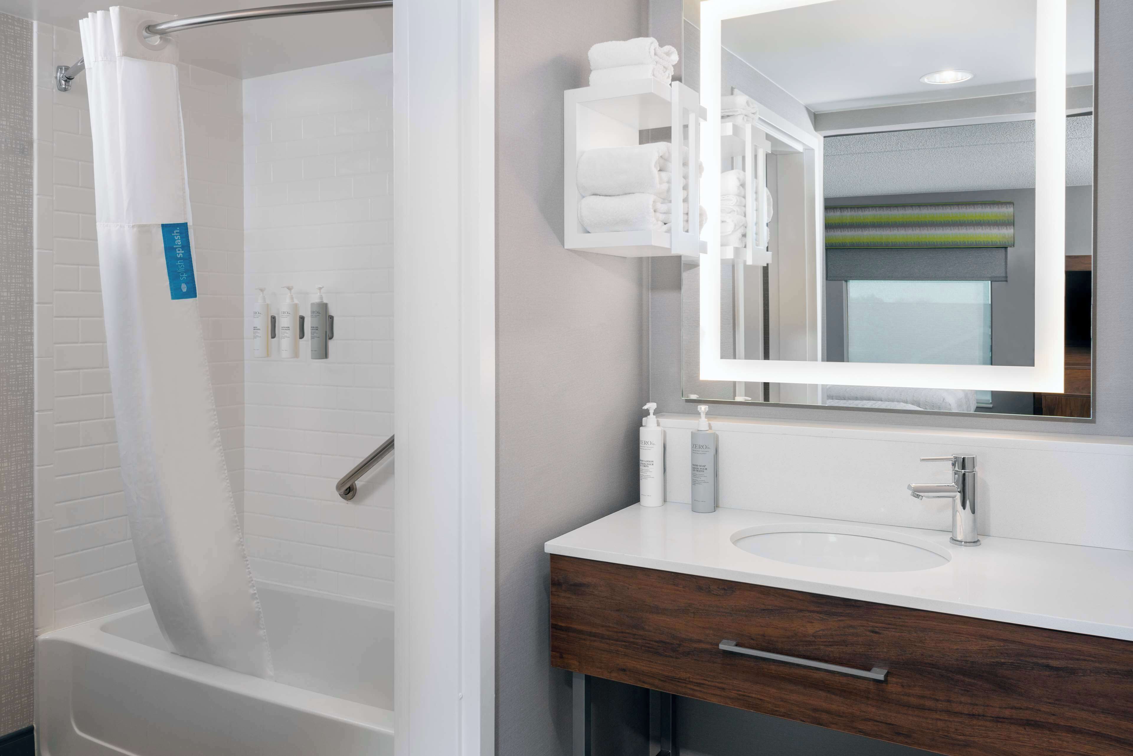 suite two queen beds | bathroom | free toiletries, hair dryer, towels