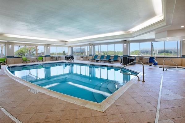 Indoor pool, open 9:00 AM to 10:00 PM, pool loungers