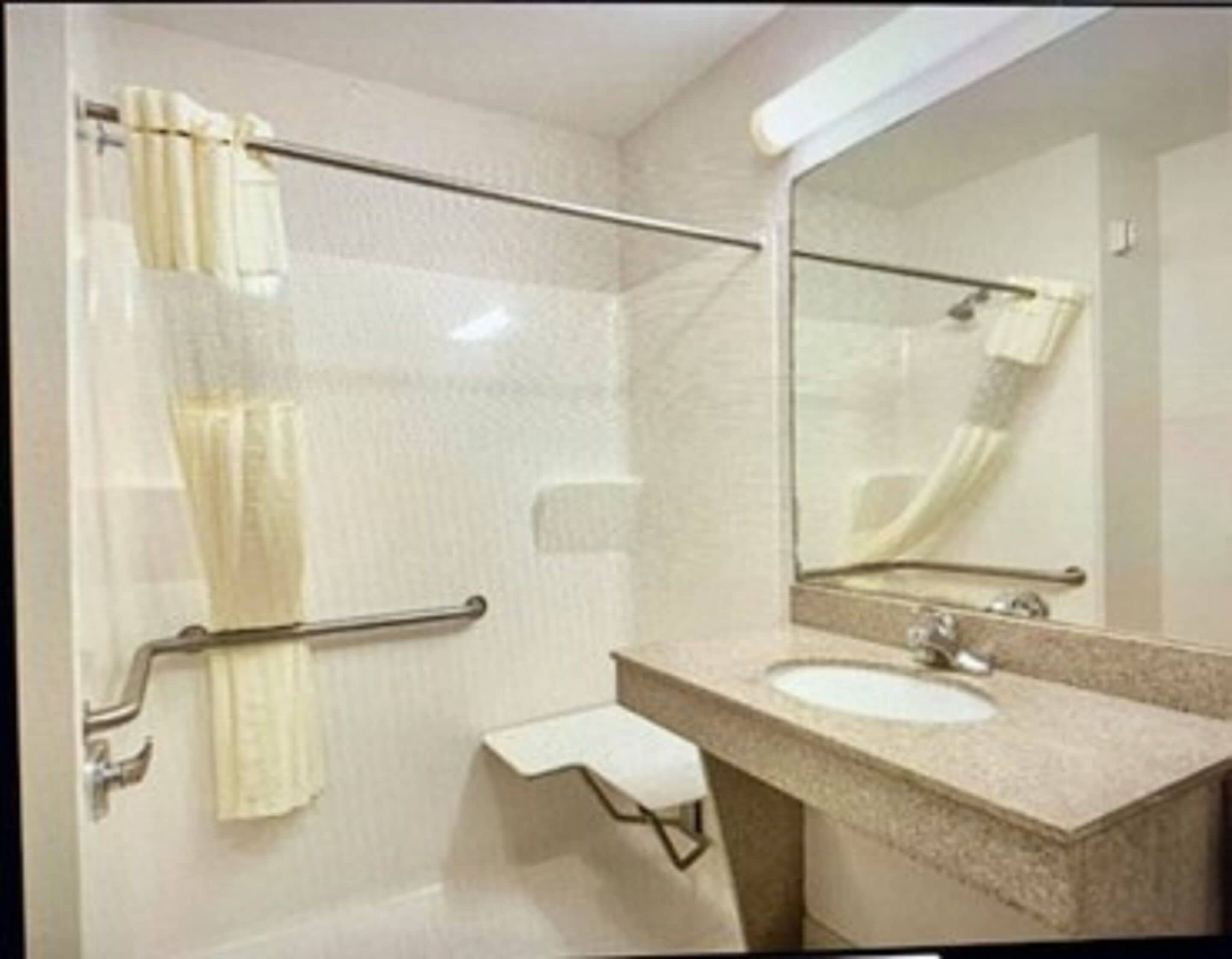 combined shower/bathtub, free toiletries, hair dryer, towels