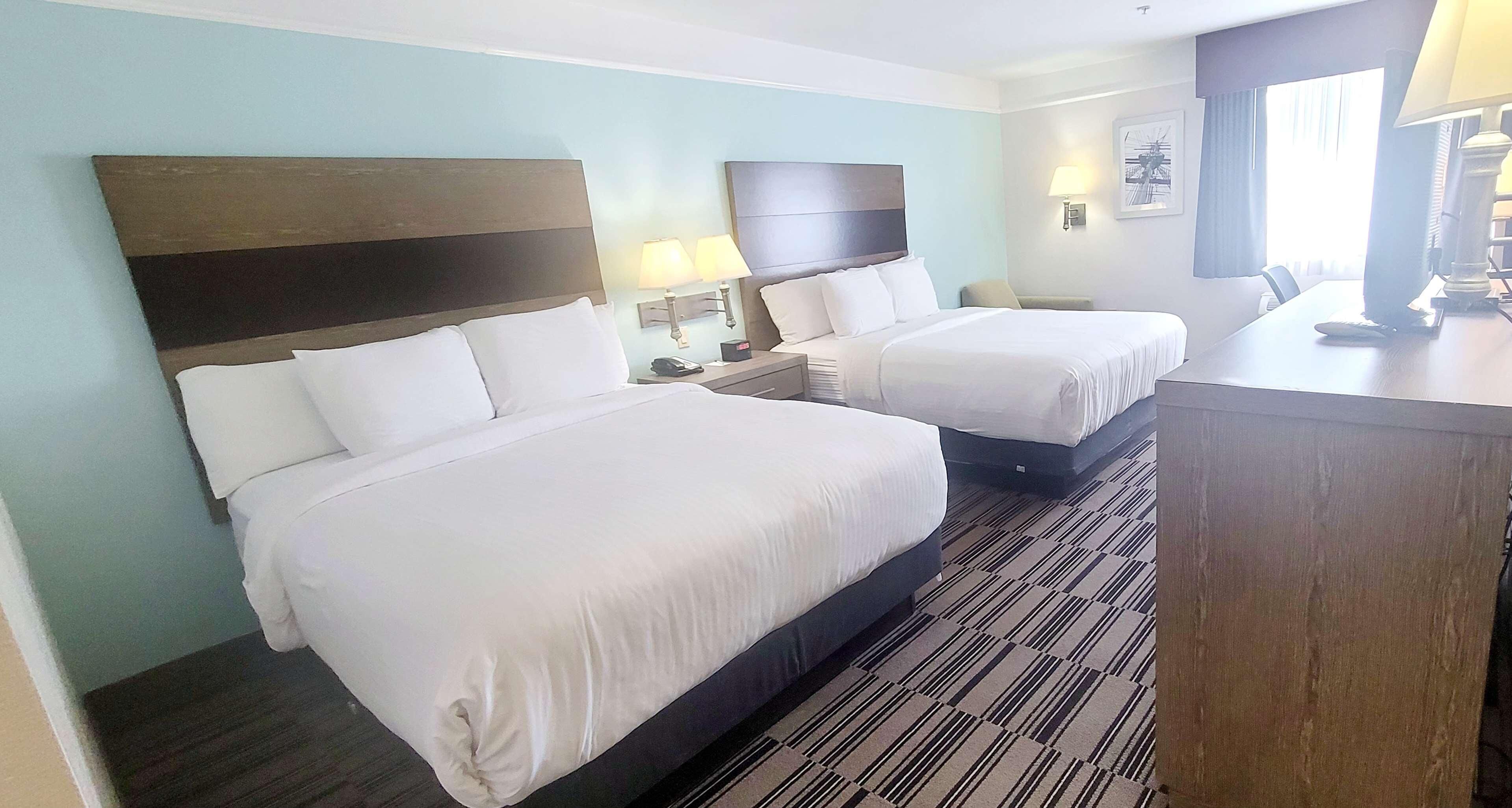 Premium bedding, down comforters, pillowtop beds, desk