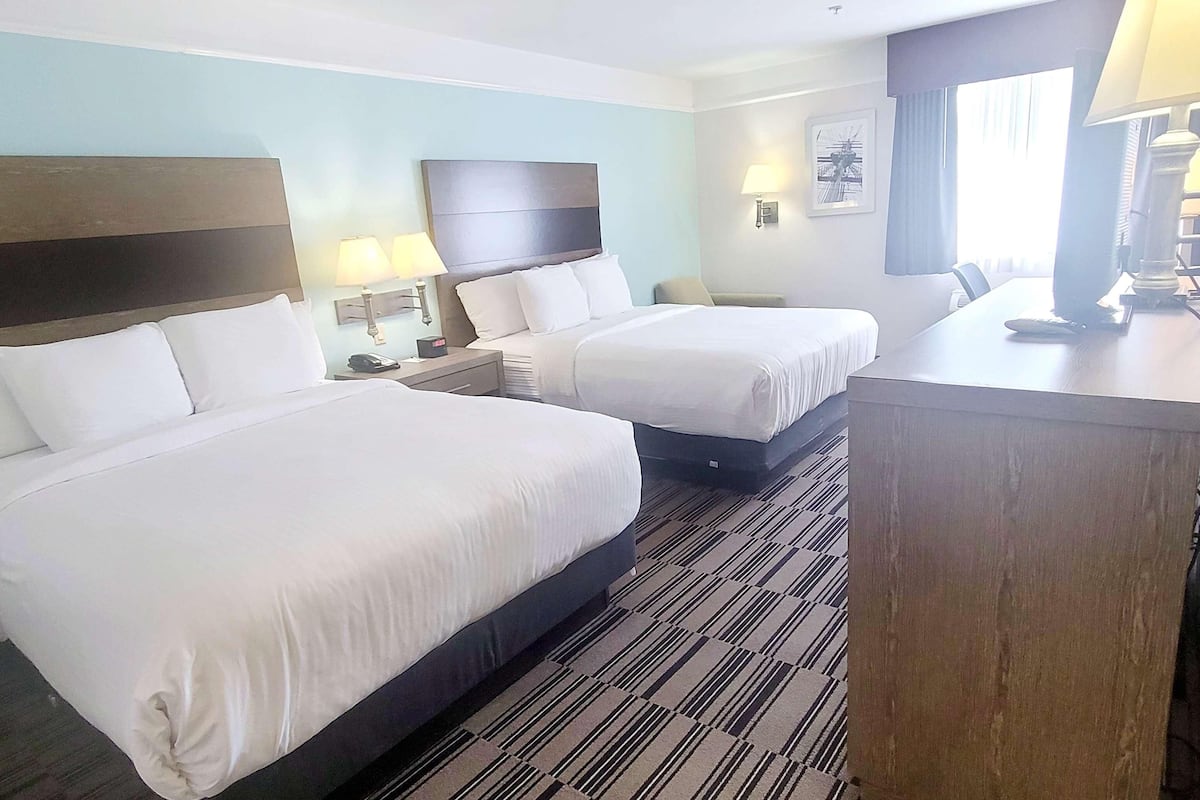 Premium bedding, down comforters, pillowtop beds, desk