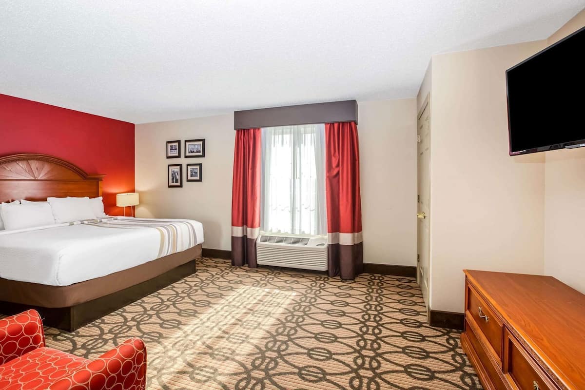 Premium bedding, pillow-top beds, desk, laptop workspace