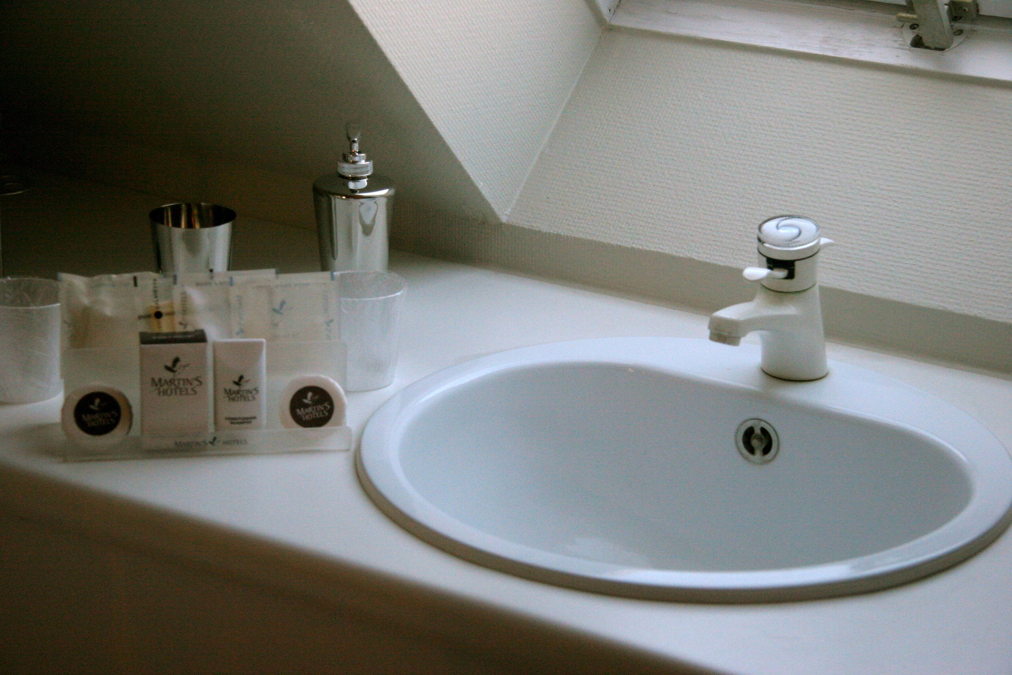 double room | bathroom | combined shower/bathtub, designer toiletries, hair dryer, bathrobes
