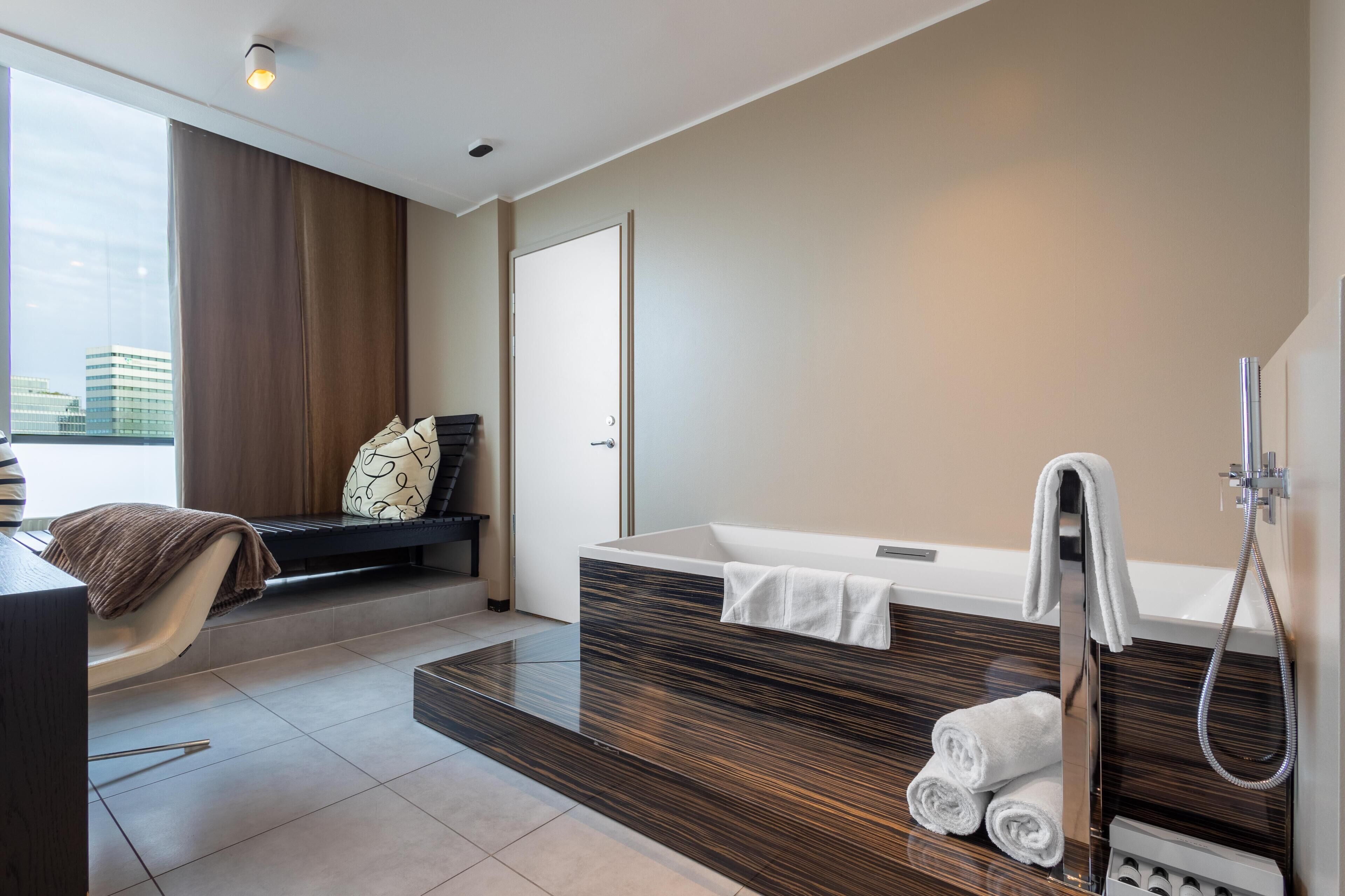 Free toiletries, hair dryer, heated floors (bathroom), towels