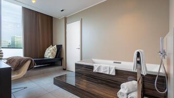 Free toiletries, hair dryer, heated floors (bathroom), towels