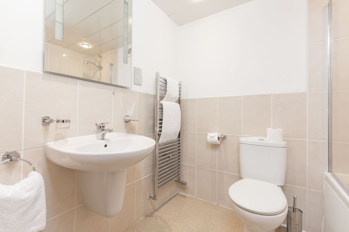 superior double room | bathroom | hair dryer, towels