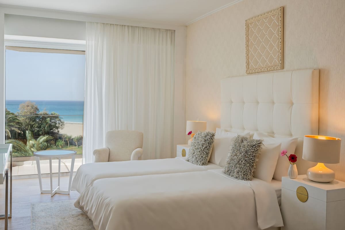 Suite familiar, vista al mar (Main Building) | Vista a la playa o el mar