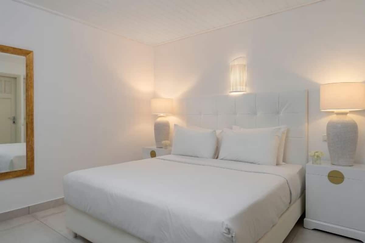 2 habitaciones, minibar y caja de seguridad en la habitación
