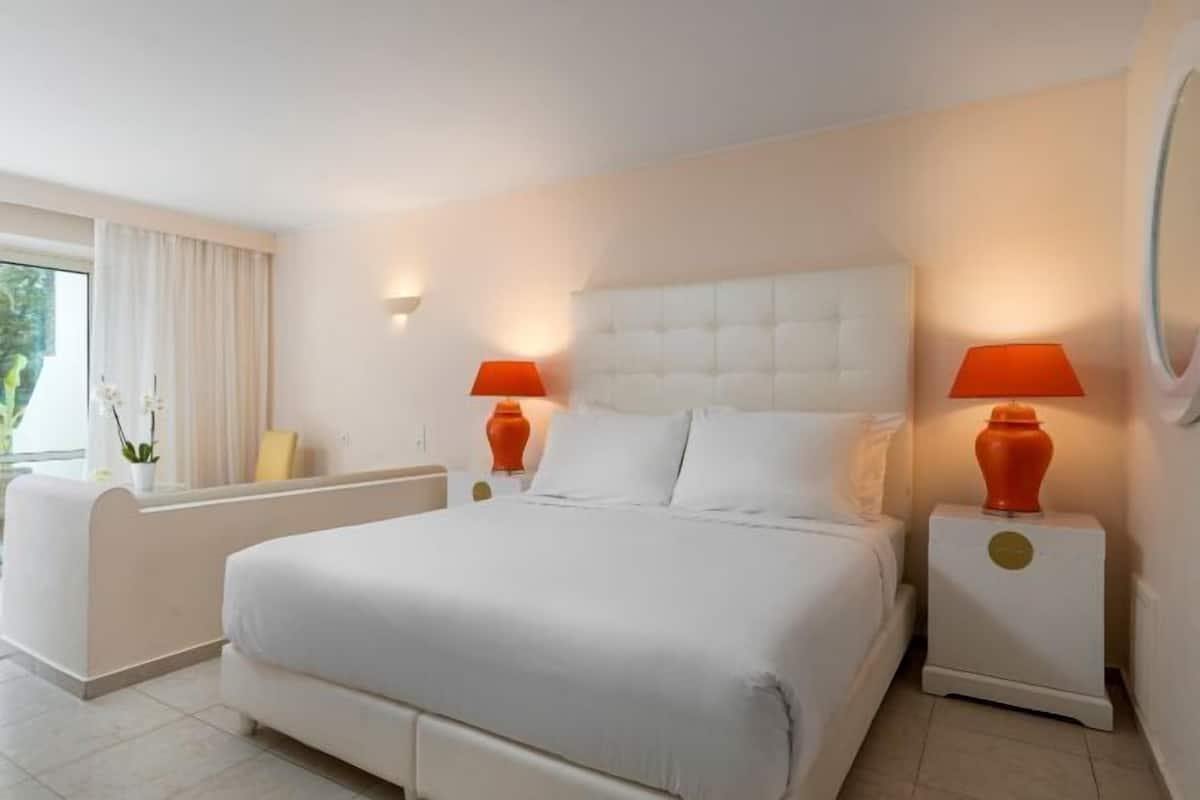 2 habitaciones, minibar y caja de seguridad en la habitación