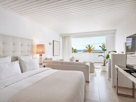 Bungalow, Sea View | Minibar, in-room safe, blackout drapes, iron/ironing board