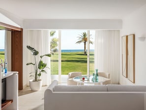 Palace Family Bungalow Suite, Side Sea View | Living area | Flat-screen TV