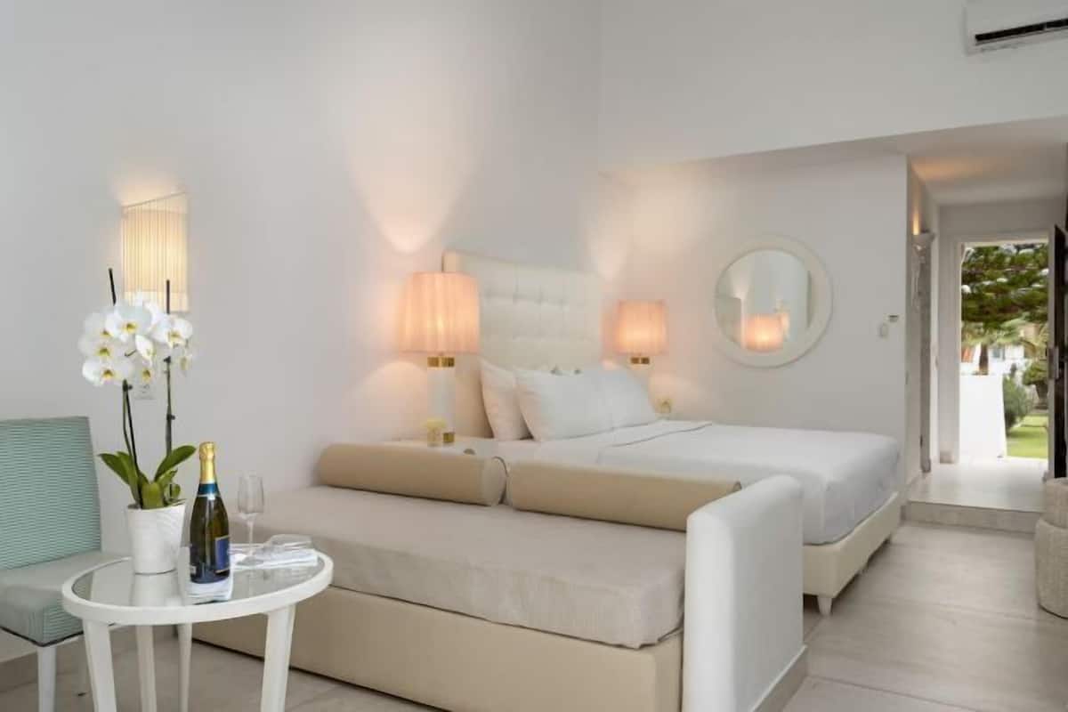 2 habitaciones, minibar y caja de seguridad en la habitación