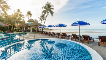 Outdoor pool, open 7:00 AM to 7:00 PM, pool umbrellas, sun loungers