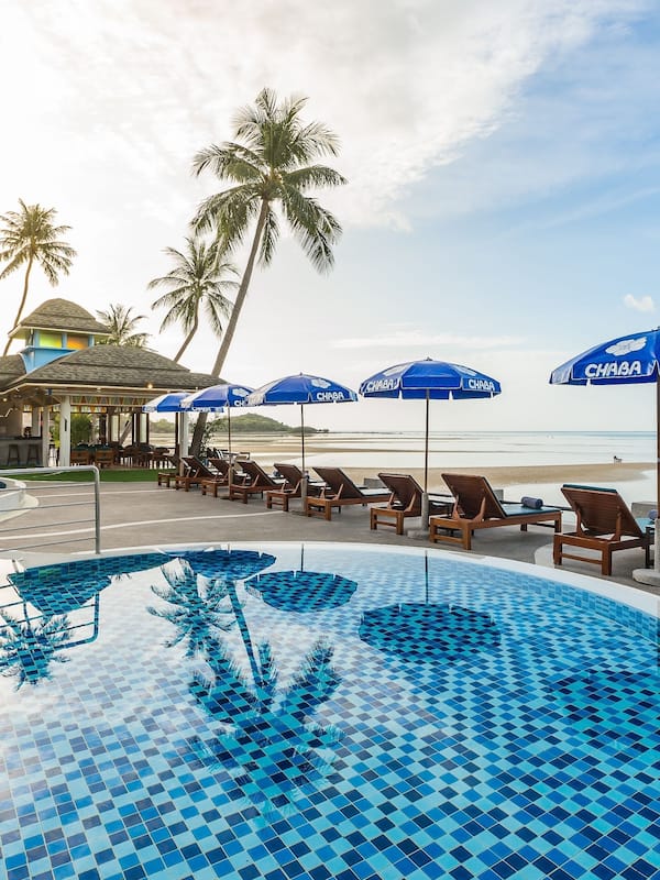 Outdoor pool, open 7:00 AM to 7:00 PM, pool umbrellas, pool loungers