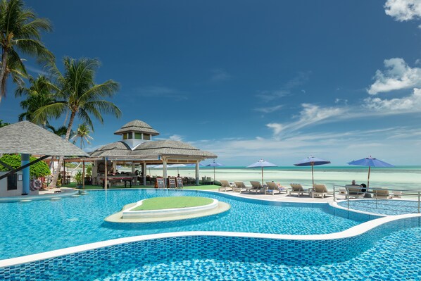 Outdoor pool, open 7:00 AM to 7:00 PM, pool umbrellas, pool loungers