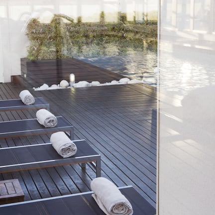 Indoor pool, pool umbrellas, sun loungers