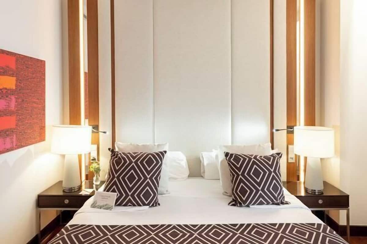 1 bedroom, down comforters, memory foam beds, minibar