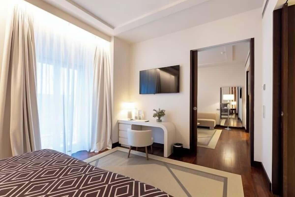 1 bedroom, down comforters, memory foam beds, minibar