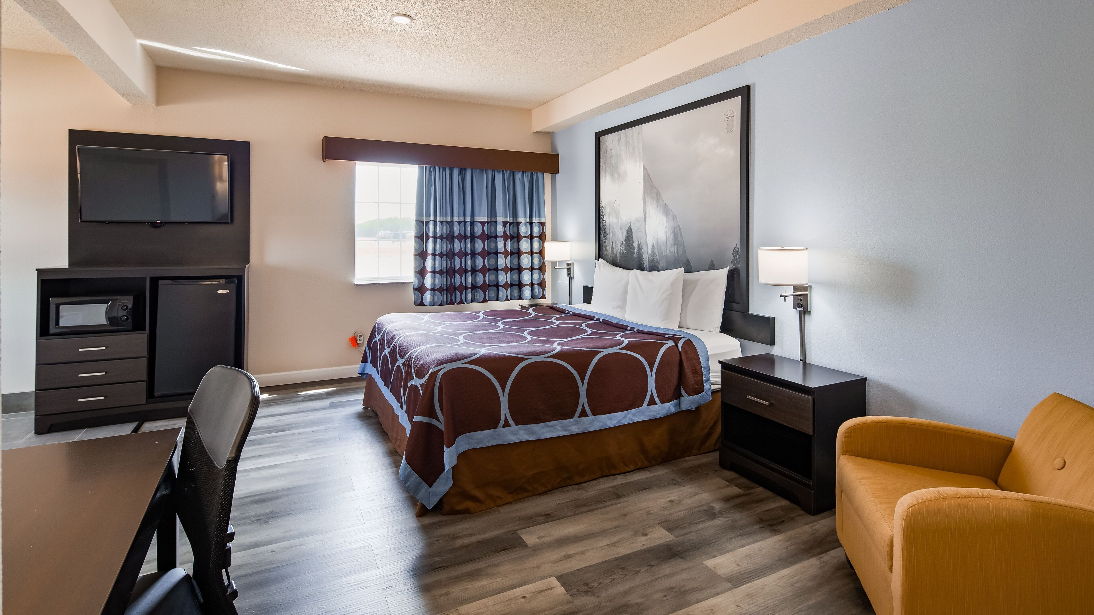 deluxe studio suite, 1 king bed, non smoking | individually decorated, individually furnished, desk, laptop workspace