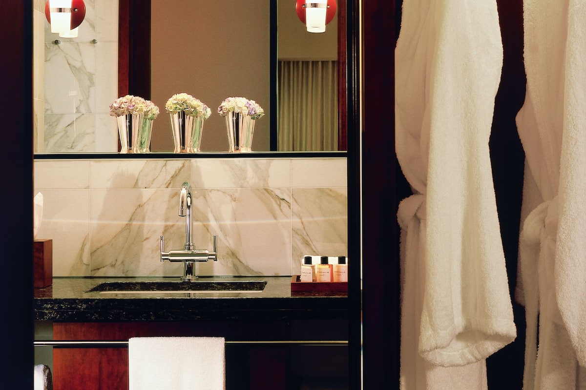 separate bathtub and shower, designer toiletries, hair dryer, bathrobes