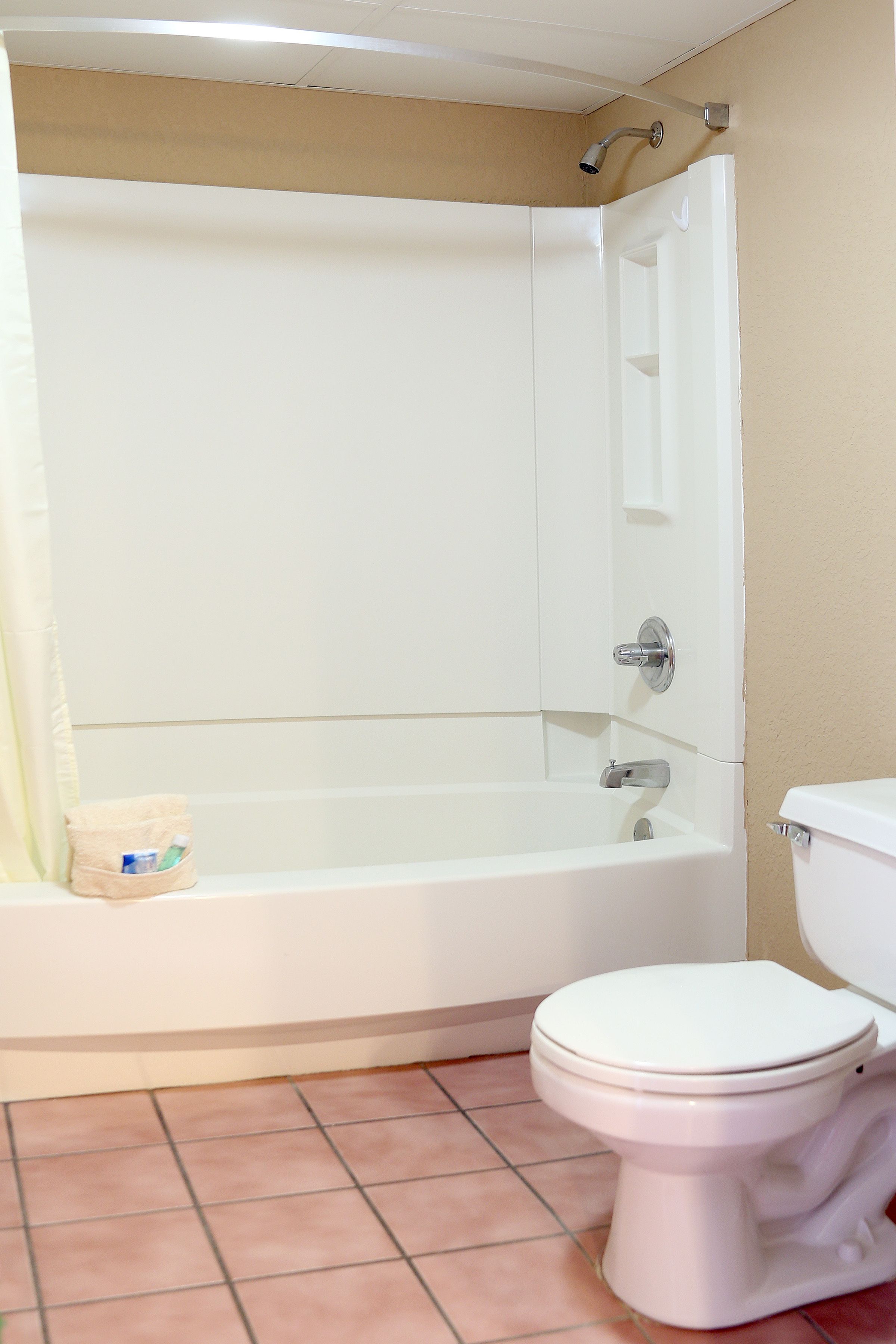 combined shower/bathtub, free toiletries, hair dryer, towels