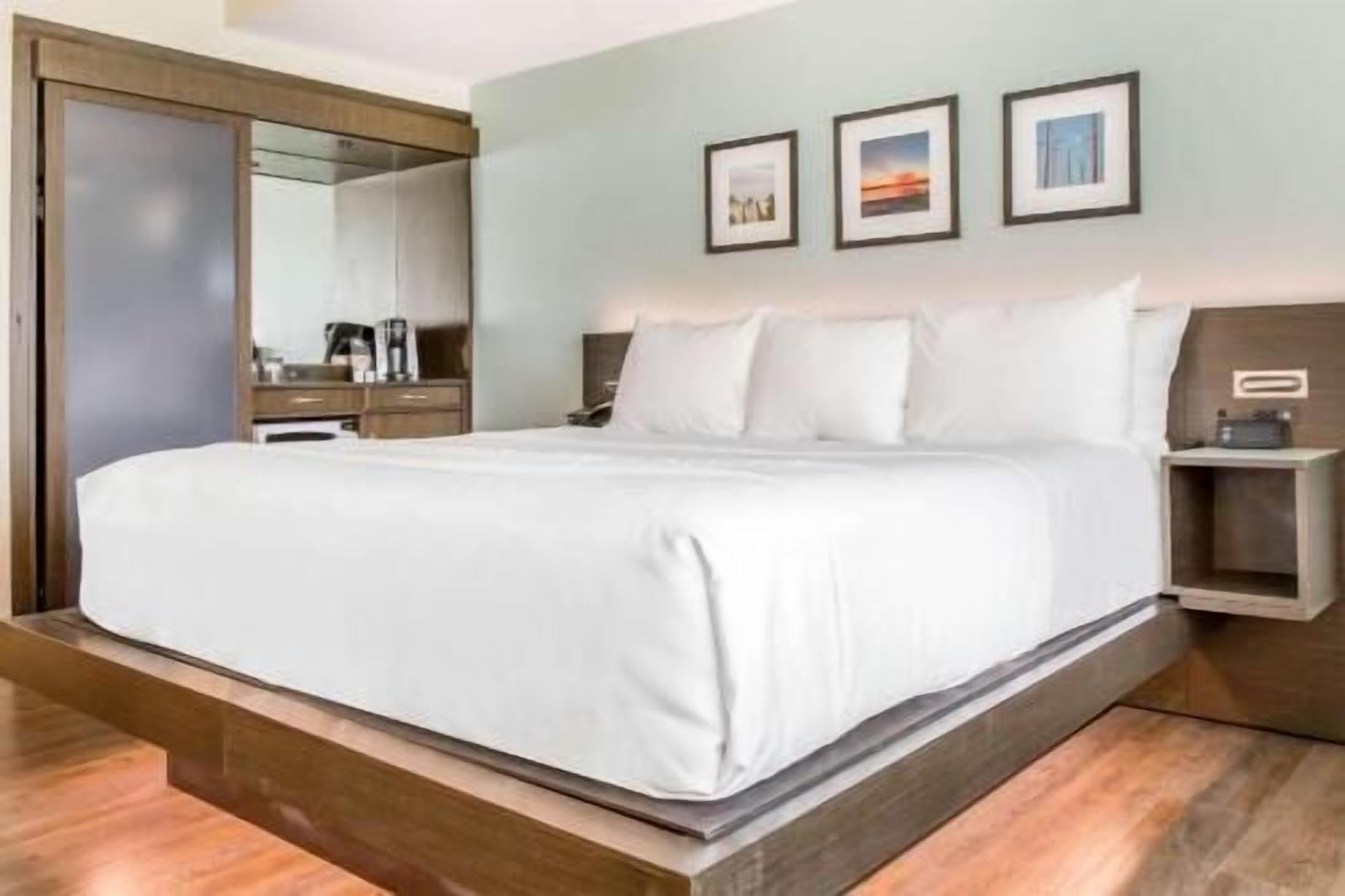 Premium bedding, pillow-top beds, desk, blackout curtains