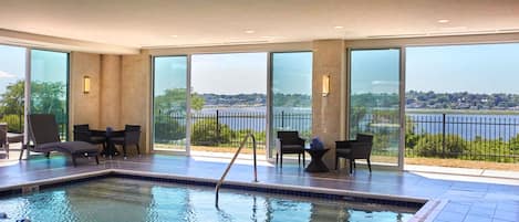 Indoor pool, pool umbrellas, sun loungers