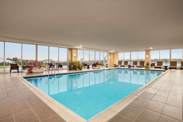 Indoor pool, pool umbrellas, sun loungers