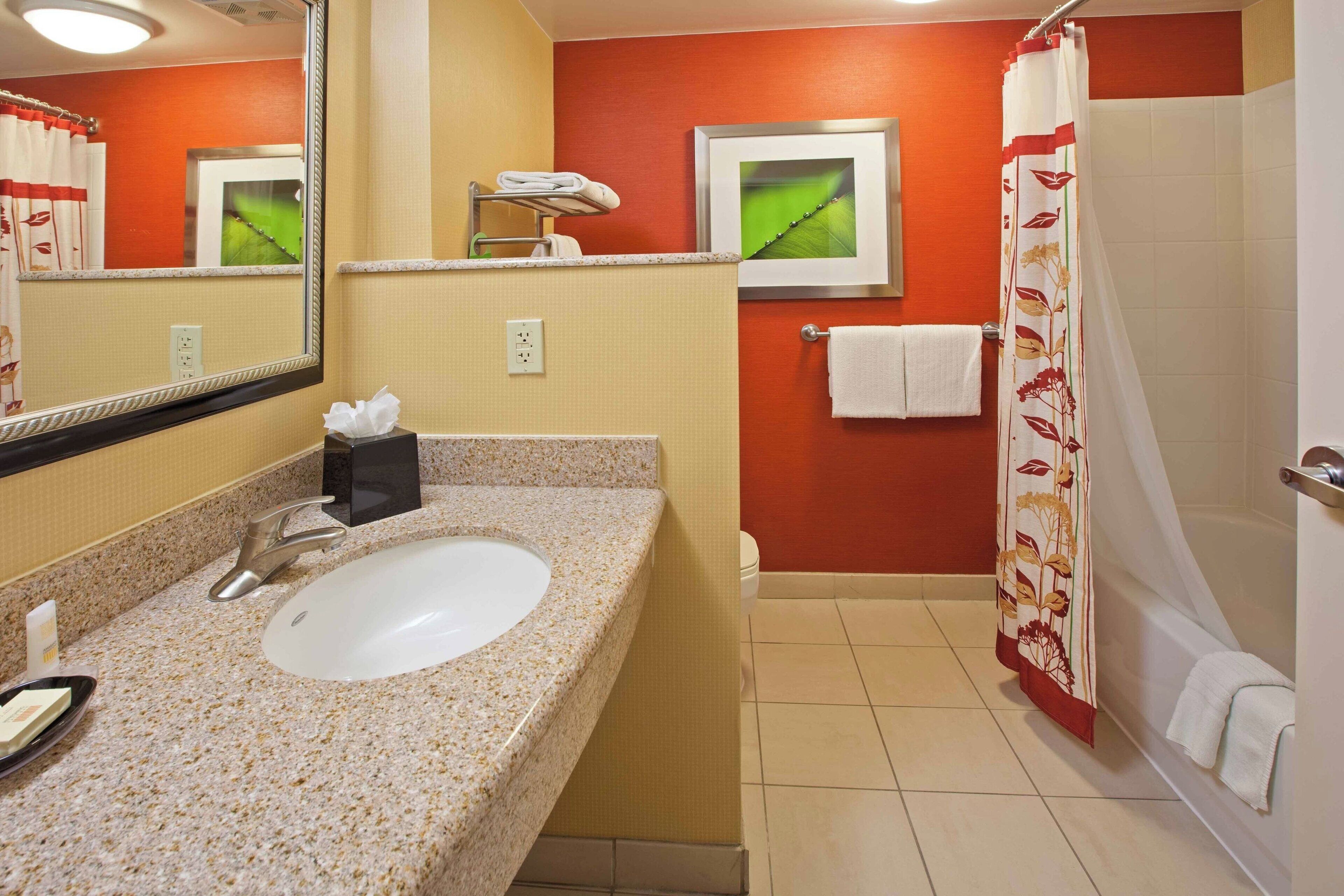 combined shower/bathtub, free toiletries, hair dryer, towels