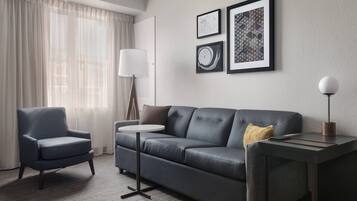 Premium bedding, desk, laptop workspace, blackout curtains