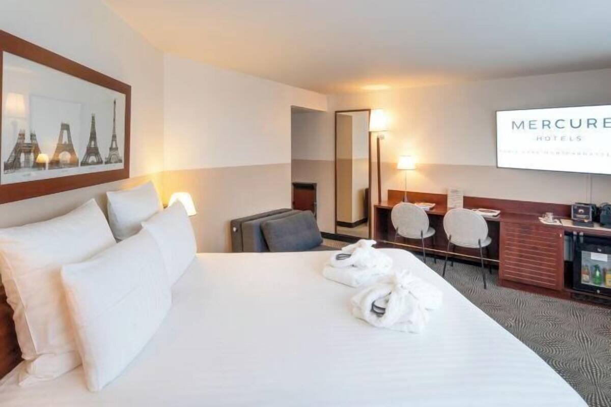 Biancheria da letto di alta qualità, minibar, cassaforte in camera