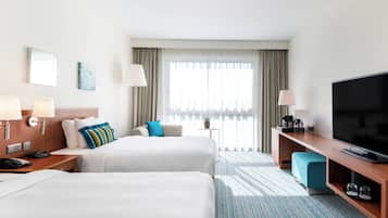 Luxe beddengoed, donsdekens, een kluis op de kamer, een bureau