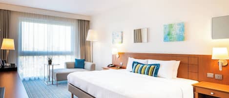 Premium bedding, down duvets, in-room safe, desk